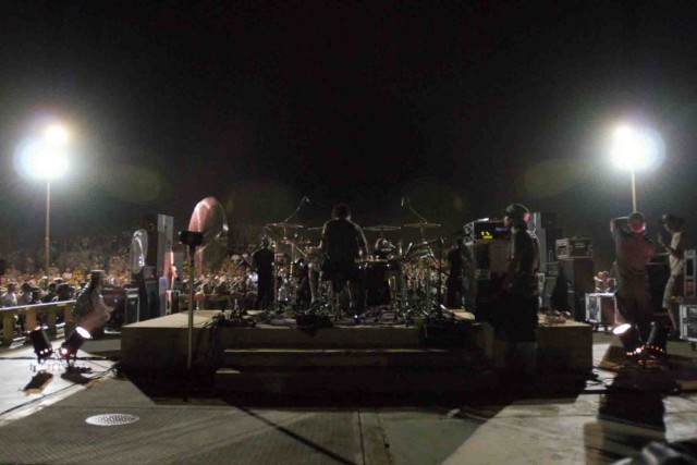 Morgan Rose, drummer for the Atlanta hard rock band Sevendust, plays from the back of the stage during a concert at Forward Operating Base Marez, in Mosul, Iraq May 26. FOB Marez serves as the headquarters for the 3rd Heavy Brigade Combat Team,...