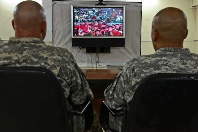 Staff Sgt. Ronal Cantarero (right), from Belton, Texas, an aircraft electrician with Company B, 615th Aviation Support Battalion, 1st Air Cavalry Brigade, 1st Cavalry Division, Multi-National Division-Baghdad, and Chief Warrant Officer 4 James Snyder...