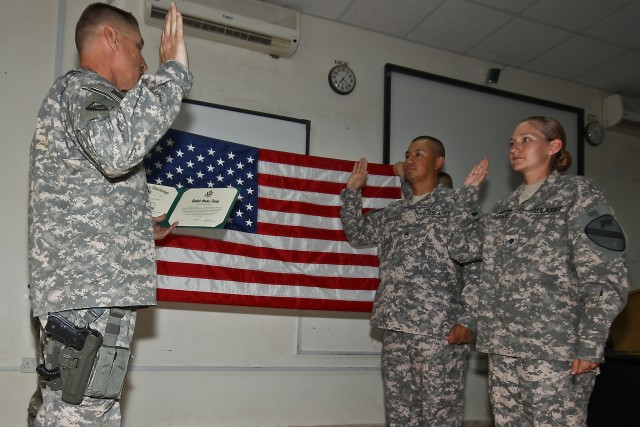 CAMP TAJI, Iraq-Reenlisting to remian in a unit together was an easy decision for married couple Staff Sgt. Anthony Garcia, from Nixon, Texas, the production control noncommissioned officer in charge, Company B, 615th Aviation Support Battalion,...