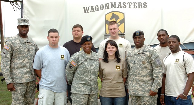 Command Sgt. Maj. Nathaniel Bartee, senior non-commissioned officer 15th Sustainment Brigade, 13th Sustainment Command (Expeditionary)(left), poses with Houston Delayed Entry Program recruits and their recruiters at the 15th SB headquarters...