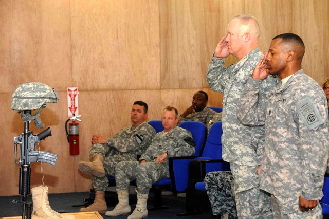 BAGHDAD - Col. Timothy McGuire (left), brigade commander of the 3rd Brigade Combat Team, 82nd Airborne Division, Multi-National Division-Baghdad, and Command Sgt. Maj. King Parks, senior enlisted leader for the 3rd BCT, 82nd Abn. Div., pay their...