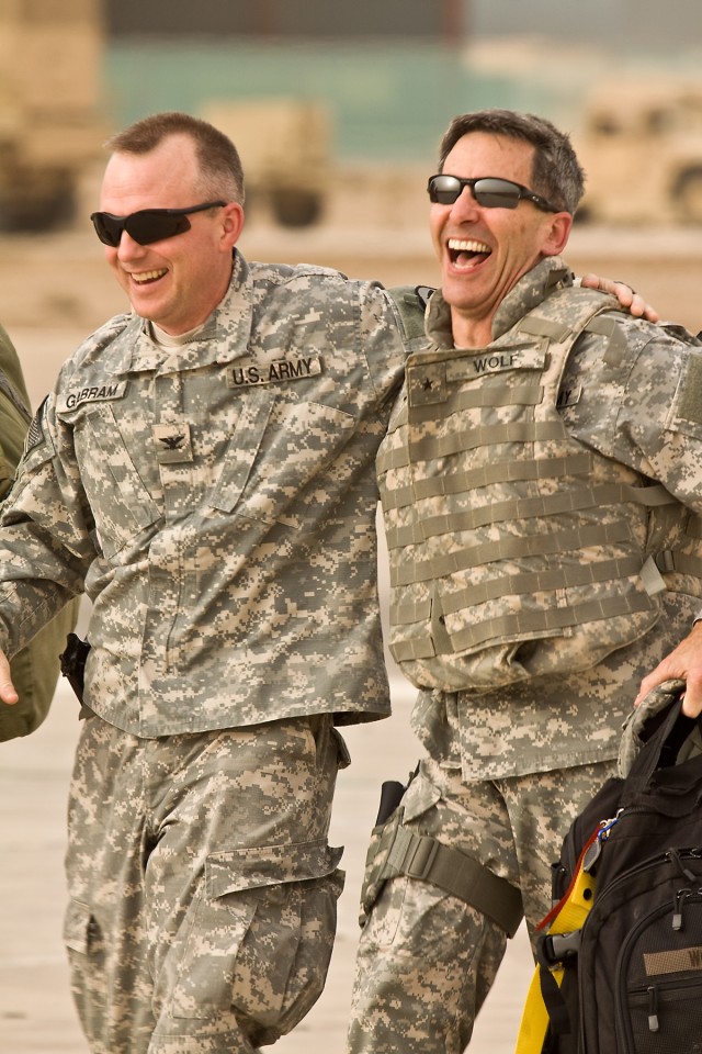 CAMP TAJI, Iraq-Brig. Gen. William Wolfe (right), the commanding general of the U.S. Army Combat Readiness Center/ Director of Army Safety, is warmly welcomed by Col. Douglas Gabram (left), commander of the the 1st Air Cavalry Brigade, 1st Cavarly Di...