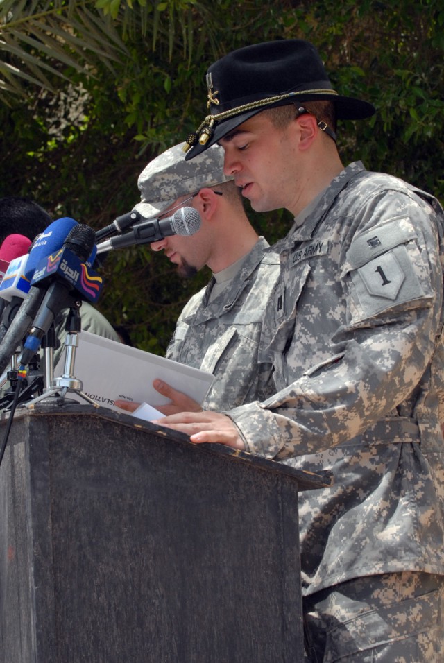 BAGHDAD - Capt. Dustin Navarro, a native of Dallas and commander of C Troop, 5th Squadron, 4th Cavalry Regiment, 2nd Brigade Combat Team, 1st Infantry Division gives a speech during the transfer of authority ceremony at JSS Khadra, June 10.  "The...
