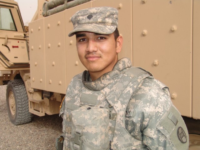 BAGHDAD - Spc. Jesus Contreras, an infantryman with Company B, 252nd Combined Arms Battalion, 30th Heavy Brigade Combat Team, at a Joint Security Station, after a patrol mission June 9. Contreras, of Porterville, Calif., is on his third...