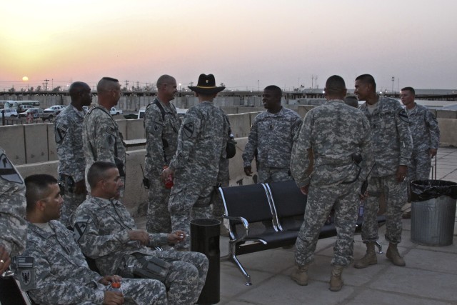 TAJI, Iraq - During a celebration for the Army's birthday, command sergeants major and first sergeants of the 1st Air Cavalry Brigade, 1st Cavalry Division, Multi-National Division - Baghdad, mingle and discuss unit operations, at Camp Taji, Iraq,...