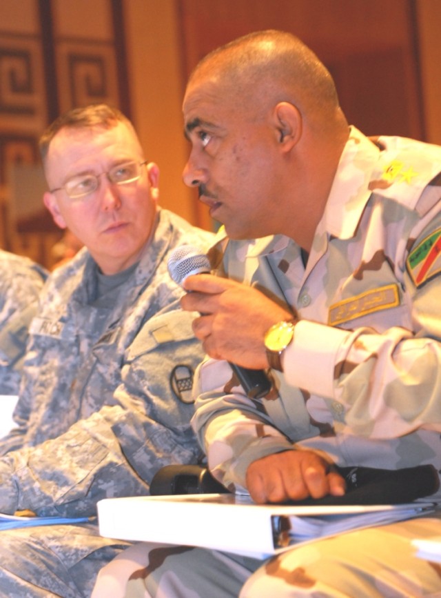 BAGHDAD - Lt. Col. Haleem (right), deputy commander of the 6th Iraqi Army Engineer Regiment responds to comments concerning equipment, training, route clearance and missions on June 13 at the Iraqi Engineer Conference in Baghdad. The 225th...