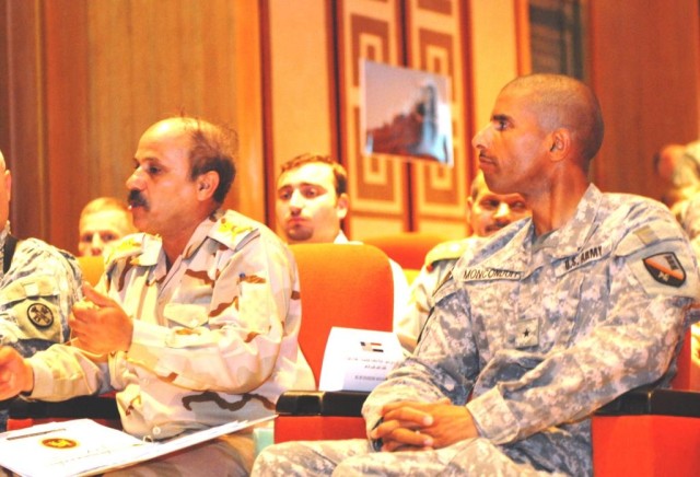 BAGHDAD - Maj. Gen. Murza Hamza (left), engineer director for the Iraqi Army answers a question posed by other Iraqi Army engineer leaders as U.S. Brig. Gen. Owen Monconduit, commander of the 225th Engineer Brigade listens, June 13 in Baghdad. The...
