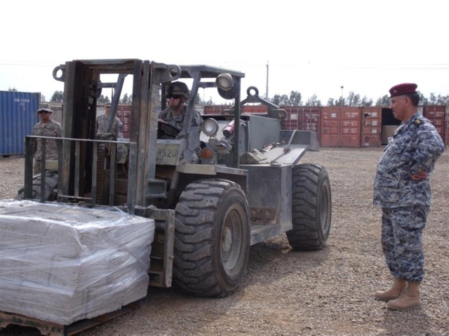 IP receives QM Co assistance help provide aid to local Iraqis
