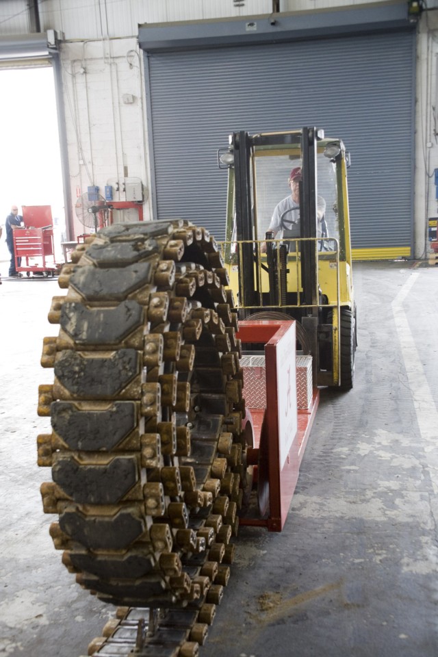 Depot builds, invents track roller for vehicle repair