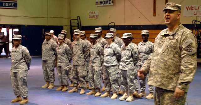 Col. Larry Phelps, commander, 15th Sustainment Brigade, 13th Sustainment Command (Expeditionary), speaks at a deployment ceremony at Kieshnick Physical Fitness Center here, June 24, for 502nd Adjutant General, 15th Special Troops Battalion, 15th...