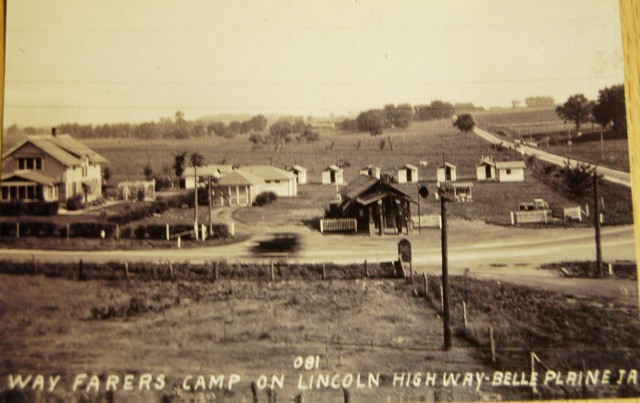 Postcard Picture of Lincoln Highway in Belle Plaine, Iowa, which was included in a packet given to drivers as they pulled into town. Caption on back reads: The Lincoln Highway, designed in 1913 began in New York City's Time Square and ended in San...