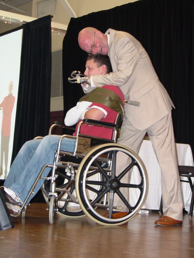 Robbins hugs his CAAA volunteer