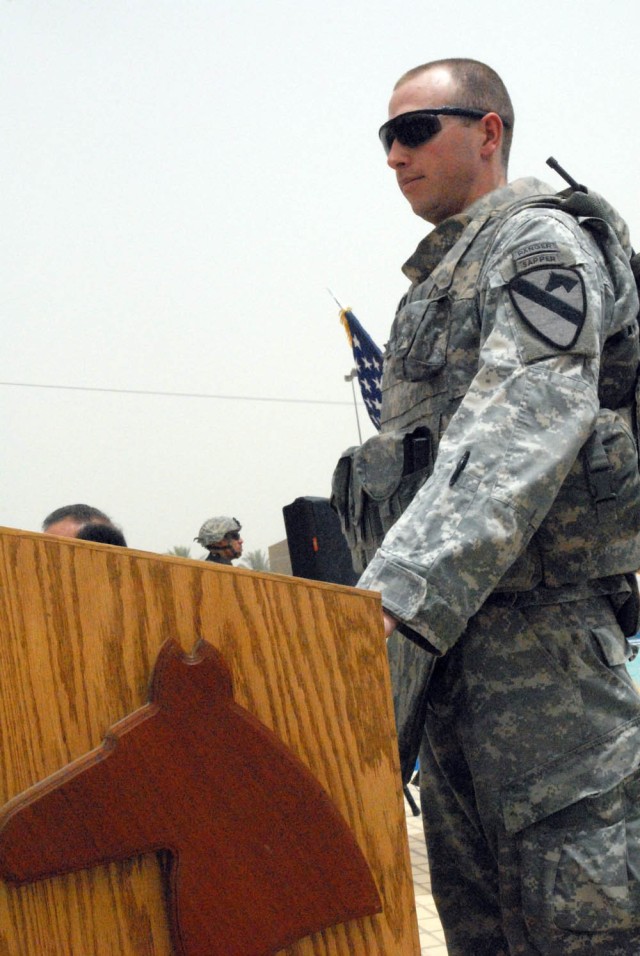 BAGHDAD- San Antonio, Texas native, Capt. Brent Kinney, commander, Company E, 1st "Black Knights" Battalion, 5th Cavalry Regiment, attached to 1st Brigade Combat Team, 1st Cavalry Division, gives a speech at the at the grand opening ceremony of...