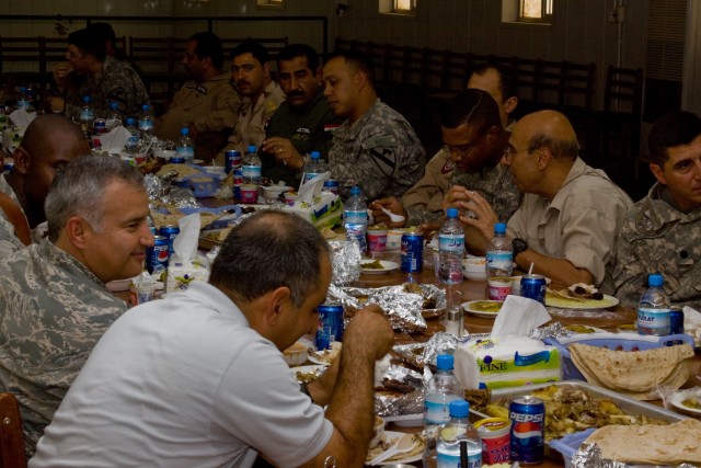AL-TAJI AIRBASE, Iraq-After a meeting with officers of an Iraqi Air Force unit and a tour of their base, leaders of the 1st Air Cavalry Brigade, 1st Cavalry Division, Multi-National Division-Baghdad, sit down with members of the Iraqi AF for...