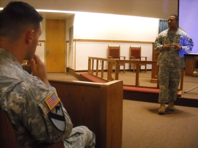 Sgt. 1st Class Stan Tolbert, a senior enlisted Soldier assigned to the 27th Brigade Support Battalion, 4th Brigade Combat Team, 1st Cavalry Division Rear Detachment, speaks to some of his fellow Soldiers about motorcycle safety and the other...