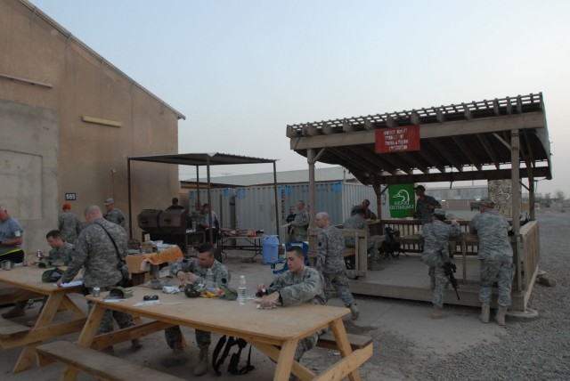 CAMP TAJI, Iraq - Pennsylvania Army National Guard Soldiers enjoy a cookout following the charter meeting of the Camp Taji, Iraq Chapter of Ducks Unlimited June 13. Over 30 new members joined DU during the event or in the week following the kickoff c...