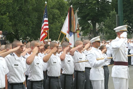 West Point cadets spread an American flag across the Yankee