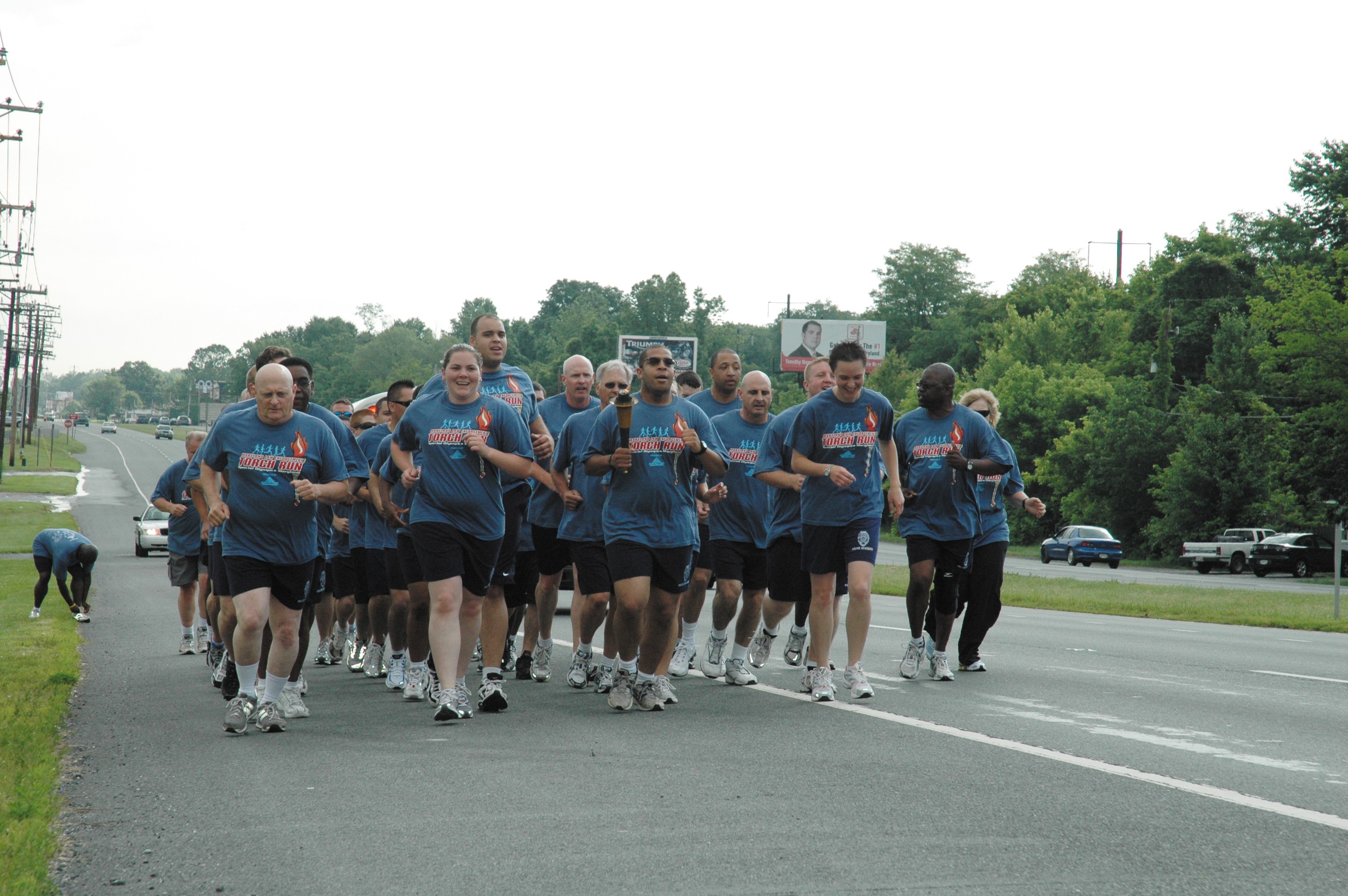 DES Police Academy carries SOMD Torch during annual run Article The