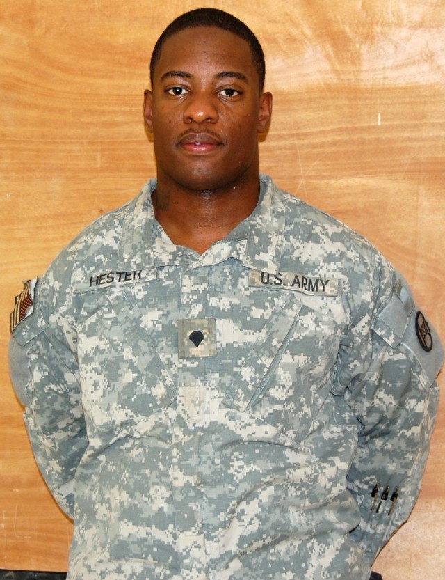 BAGHDAD - Spc. George Hester, a network help desk representative of the 30th...