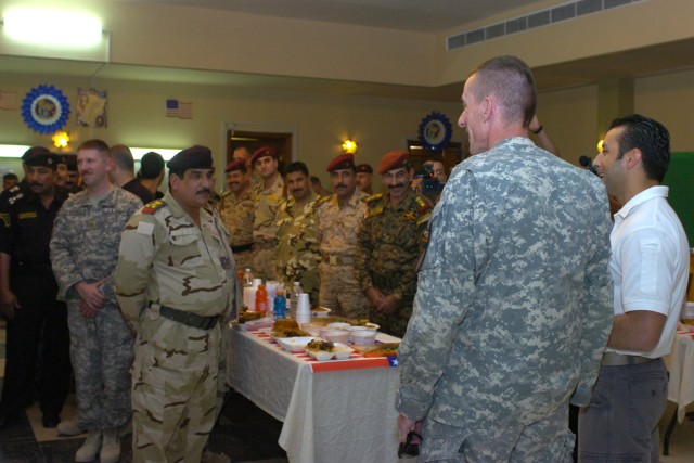 Col. Gary Volesky, the commander of the 3rd Heavy Brigade Combat Team, 1st Cavalry Division welcomes officers from all the branches of the Iraqi Security Forces and U.S. Forces at a luncheon held on Forward Operating Base Diamondback July 4. The even...