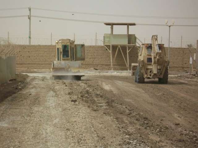 BAGHDAD - The final process of the road improvements conducted on Strawberry Hill, on the Victory Base Complex was to run the smooth faced roller across the road and provide a finished look to the road.  The heavy equipment operators of the 277th...