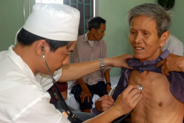 Elders receive medical attention from the Vietnam MEDRETE Team