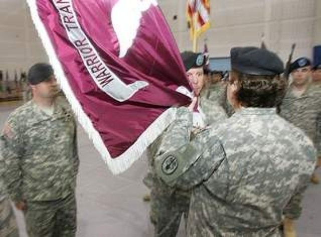 Lt. Col. Natalie Lonkard accepts colors
