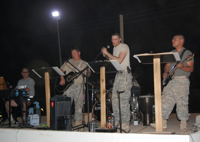 BAGHDAD - Seeking Solace, a band comprised of 30th Heavy Brigade Combat Team members, gave a special July Fourth concert to entertain a crowd of about 100 Soldiers and civilians on Forward Operating Base Falcon. They usually play at Sunday worship se...