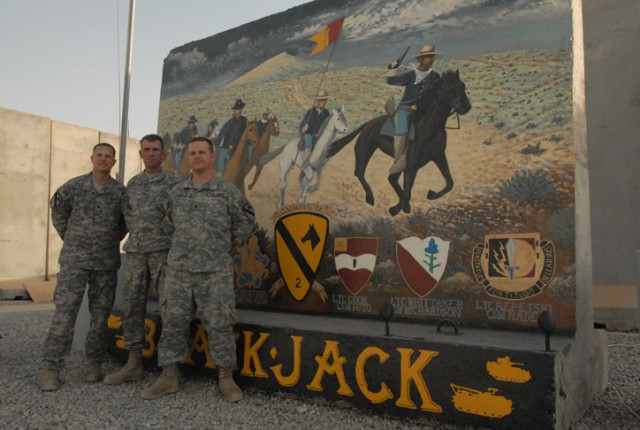 Spc. John Lenaghan (left), a Fairbault, Minn., native and a forward observer with Headquarters and Headquarters Company, 2nd Brigade Combat Team, 1st Cavalry Division, Sgt. 1st Class Leo Davis (center), a Woodward, Okla., native and forward...