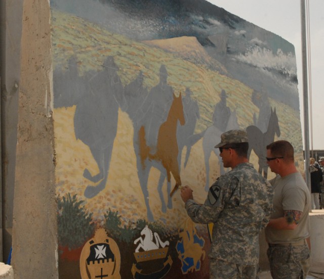 Sgt. 1st Class Leo Davis (left), a Woodward, Okla., native and forward observer with Headquarters and Headquarters Company, 2nd Brigade Combat Team, 1st Cavalry Division, and Sgt. Michael Chandler, a San Diego native and also a forward observer...
