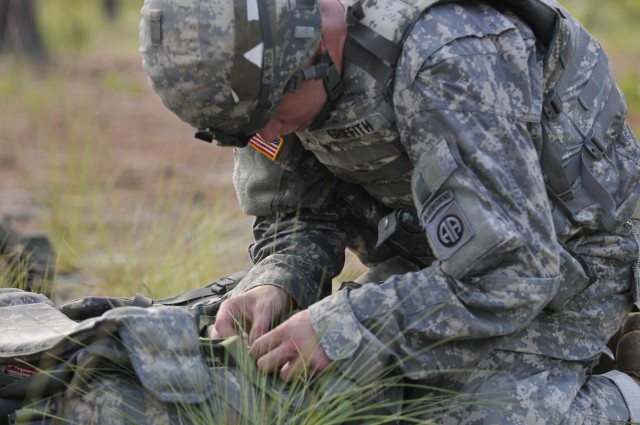 Pvt. Griffith rigging his ruck