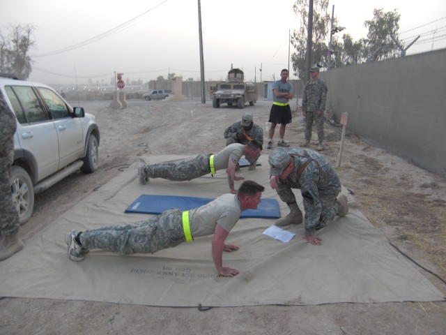 Soldiers from 3rd Brigade Combat Team, 1st Cavalry Division conducting a nonstandard PT test during the Greywolf Best Warrior Competition July 16. The PT test only allowed four minute breaks between events instead of the standard ten minutes. At...