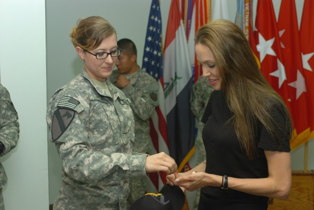 BAGHDAD - Fargo, N.D. native, Sgt. Adrienn Falk, administrative assistant to the commanding general, 1st Cavalry Division, Multi-National Division-Baghdad,...