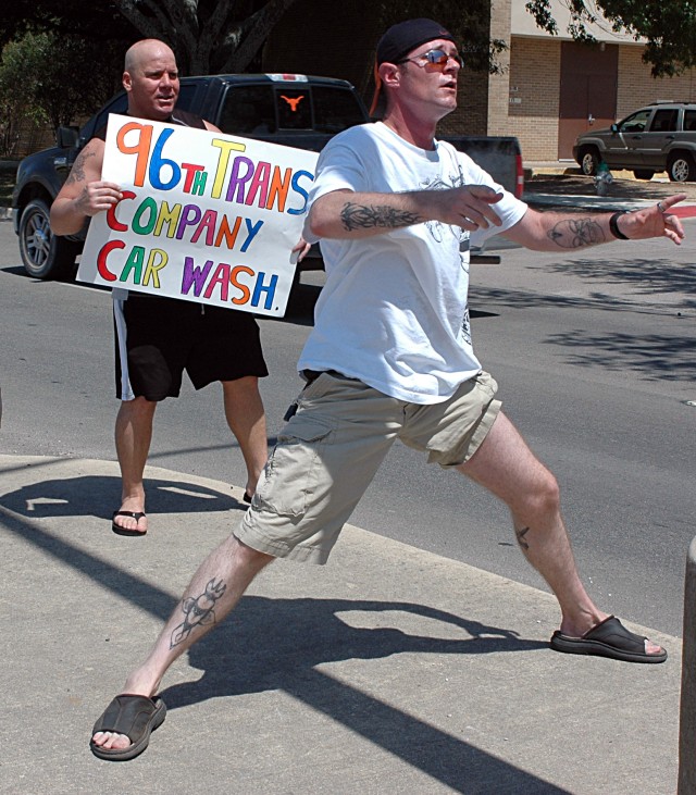 96th Transportation Company, 180th Transportation Battalion, 4th Sustainment Brigade, 13th Sustainment Command (Expeditionary), rear detachment Soldiers took part in a car wash fundraiser sponsored by the unit's Family Readiness Group, in support...