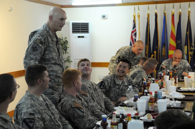 Gen. Raymond Odierno, Commanding General of Multi-National Forces Iraq, talks with Soldiers from Headquarters and Headquarters Company, 1st Battalion, 12th Cavalry Regiment, 3rd Brigade Combat Team, 1st Cavalry Division on July 25 at Forward Operatin...