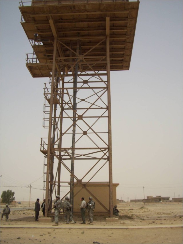 The Soldiers of Echo Forward Support Company, 1st Battalion, 12th Cavalry Regiment, 3rd Brigade Combat Team, 1st Cavalry Division conduct a site assessment of the Al Hadr water tower with local leaders and municipalities manager to develop a...