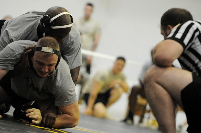 U.S. Army Pvt. Damien Blaine (top), with Bravo Company, 3rd Battalion, 8th Cavalry Regiment, 3rd Heavy Brigade Combat Team, 1st Cavalry Division, and Spc. Jerry Gayton (bottom), with Echo Company, 1st Battalion, 67th Armor Regiment, attached to...