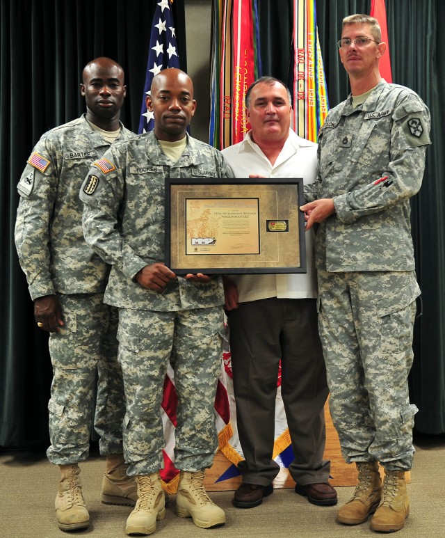 (Left to right) Command Sgt. Maj. Nathaniel Bartee, senior non-commissioned officer; Sgt. First Class Lastazar Tucker, senior mentor; Dave Sullivan, safety officer; and Sgt. First Class John Tackett, senior mentor, all of the 15th Sustainment Brigade...
