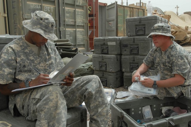 BAGHDAD - Augusta, Ga. native, Staff Sgt. Randolph Middlebrook (left), the...