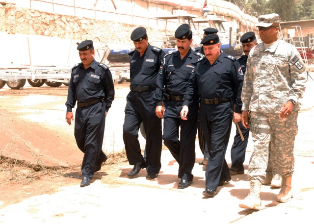 BAGHDAD - Iraqi Police Patrol Director, Maj. Gen. Ali and Col. Byron Freeman, commander, 8th Military Police "Watchdog" Brigade, who hails from Norfolk, Va., attended the Iraqi Police River Patrol Graduation ceremonies on the banks of the Tigris Rive...