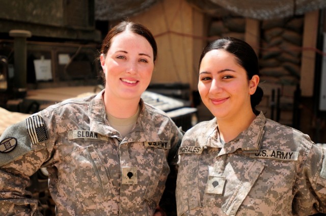 BAGHDAD -- Spc. Felicia Sloan (left), of Lumberton, N.C., and Spc. Yessenia Morales, of High Point, N.C., are drivers with the personnel protection detachments that shield the 30thHeavy Brigade Combat Team's command group at Forward Operating Base Fa...