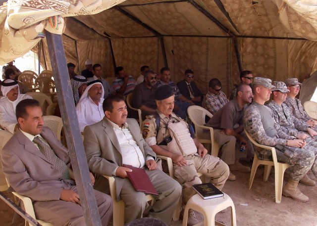 BAGHDAD - Leaders of the Iraqi government in Abu Ghraib and of the 2nd Heavy Brigade Combat Team, 1st Infantry Division, Multi-National Division - Baghdad attend the ground-breaking ceremony of the Zaidon water treatment facility in Abu Ghraib...