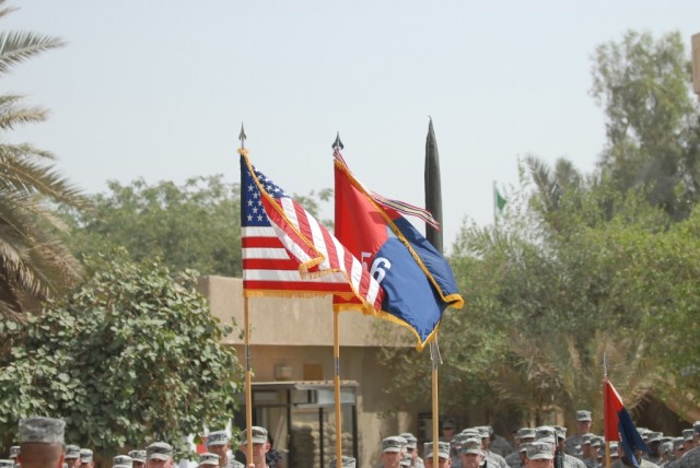 BAGHDAD - The colors of the 56th Infantry Brigade Combat Team, 36th Inf. Division of the Texas Army National Guard fly in formation with 'Old Glory' one last time at a transfer of authority ceremony Aug. 1 with the 41st IBCT of the Oregon National...
