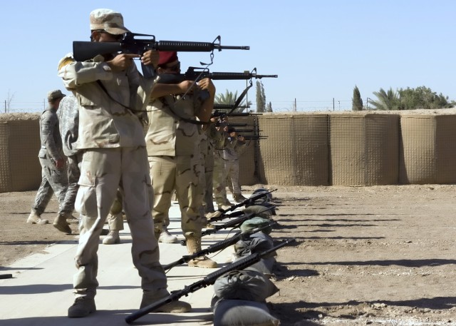 BAGHDAD - A group of over two dozen Iraqi Army Soldiers from the 24th Brigade, 6th IA Division participate in a course designed to improve marksmanship at Forward Operating Base Constitution July 31. The week-long course was instructed by Soldiers fr...