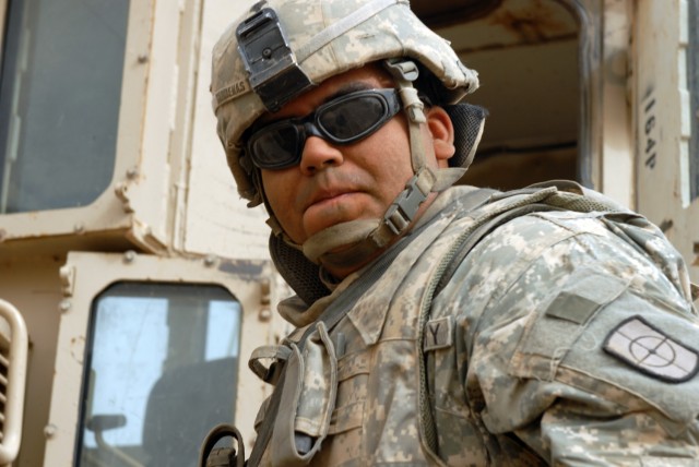 BAGHDAD - Army Reserve Soldier, Spc. Franklin Cardenas, a heavy equipment operator assigned to the 277th Engineer Company, 46th Engineer Battalion, 225th Engineer Brigade, exits the D-9 bulldozer after clearing enormous concrete slabs from beneath...