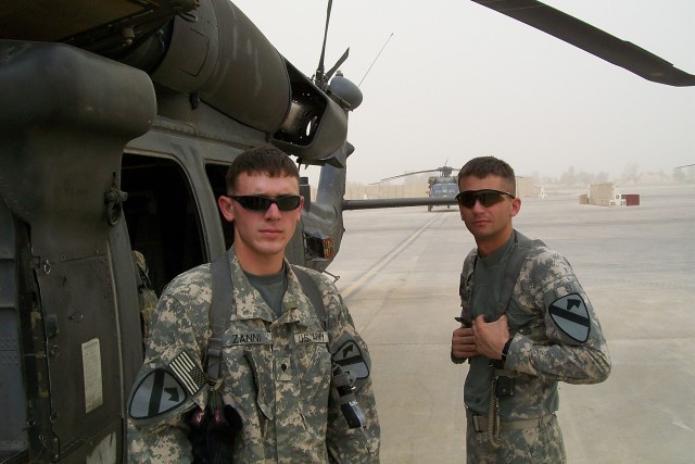 CAMP TAJI, Iraq-Spc. Ryan Zanni (left), of Portland, Ore., a water purification specialist, and Sgt. Douglas Owens (right), from Azel, Texas, a heavy wheeled vehicle operator, both from Company E, 2nd Battalion, 227th Aviation Regiment, 1st Air...