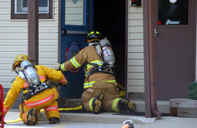 Soldiers and civilians come together to fight fires