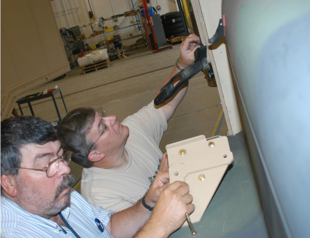 Up-armored truck helps workers design, modify CREW brackets