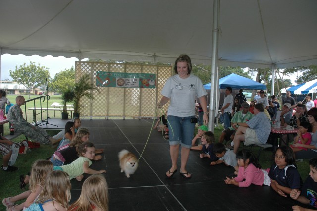Dog Days of Summer: Dog owners strut their stuff at premier event