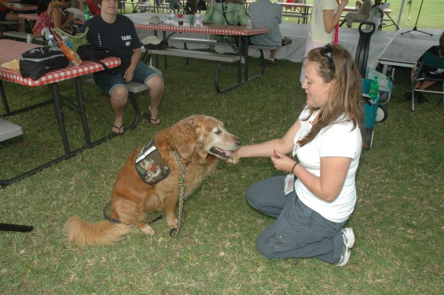 Dog Days of Summer: Dog owners strut their stuff at premier event